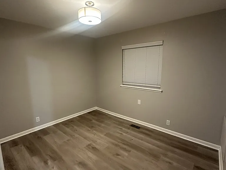 Bedroom 3 Newer Lighting . Flooring and Paint.