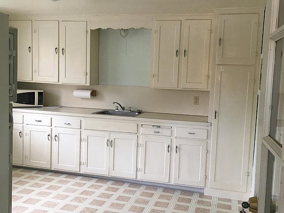 kitchen with ample storage and cabinets