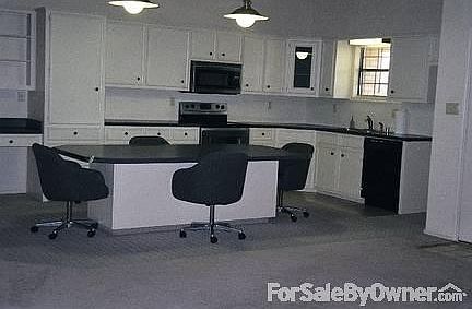 Great Room - Open Floorplan
						:
						Kitchen & Great Room Combo with Fireplace & Built In Book Shelves