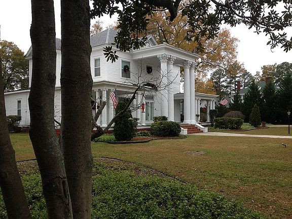 Shaded by Magnolias & Acacia