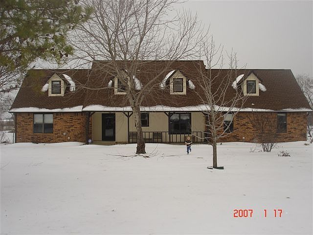view from south side of front yard in winter