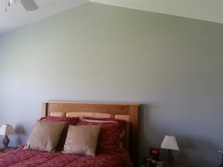 Master Bedroom with vaulted ceiling and casa blanc style fan