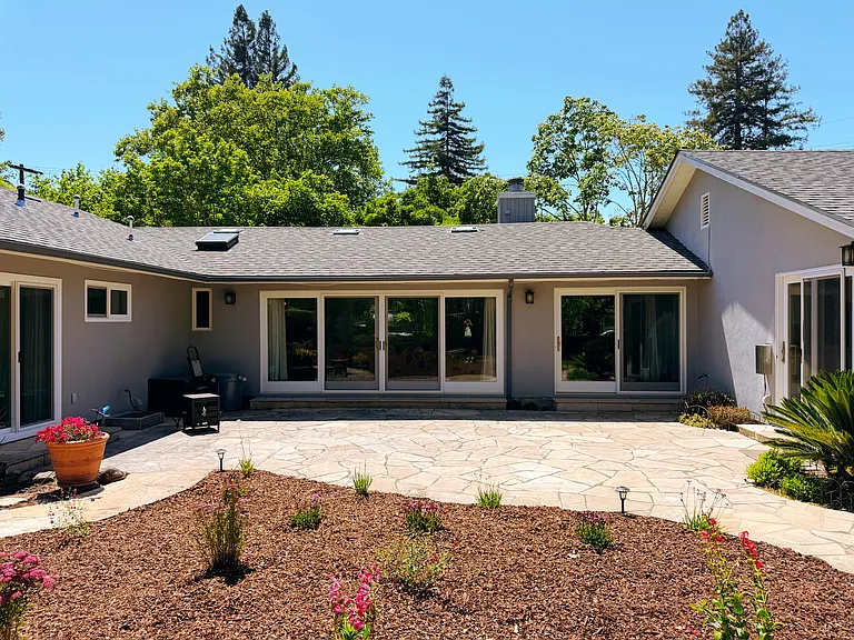 Patio area in front next to living room sliding door