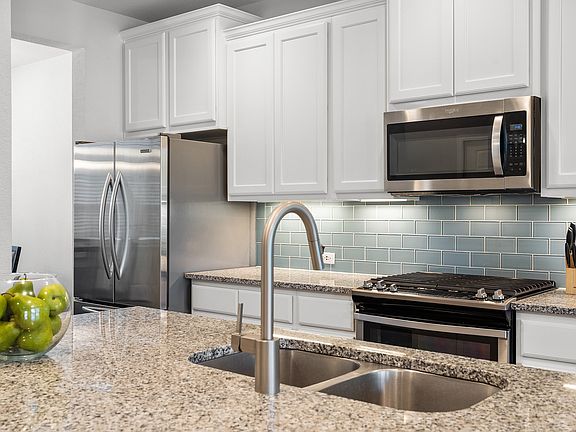 Open floorplan features kitchen and living room