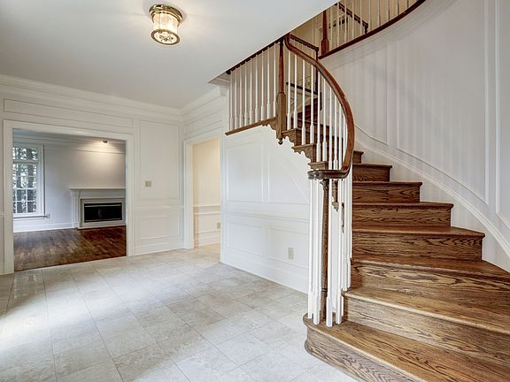 Entry Foyer with Curved Staircase