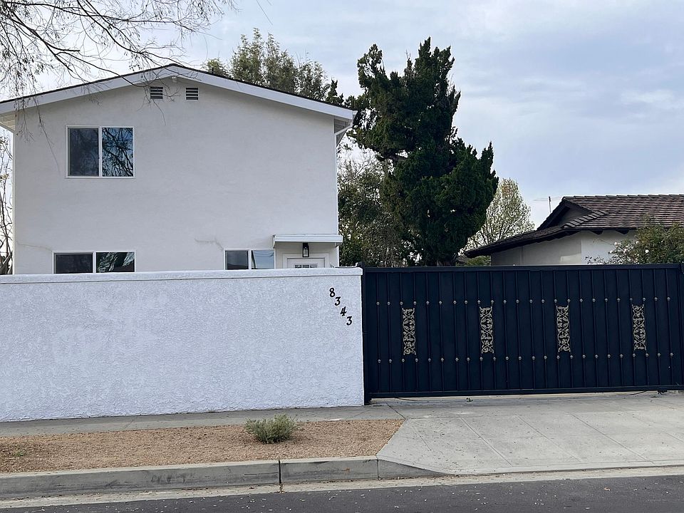 Rudnick Ave View with entry gate to the house.