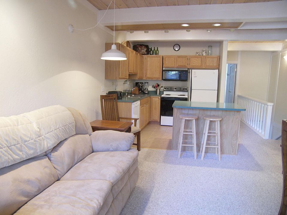 Upstairs open floor plan living, dining, kitchn, pellet stove