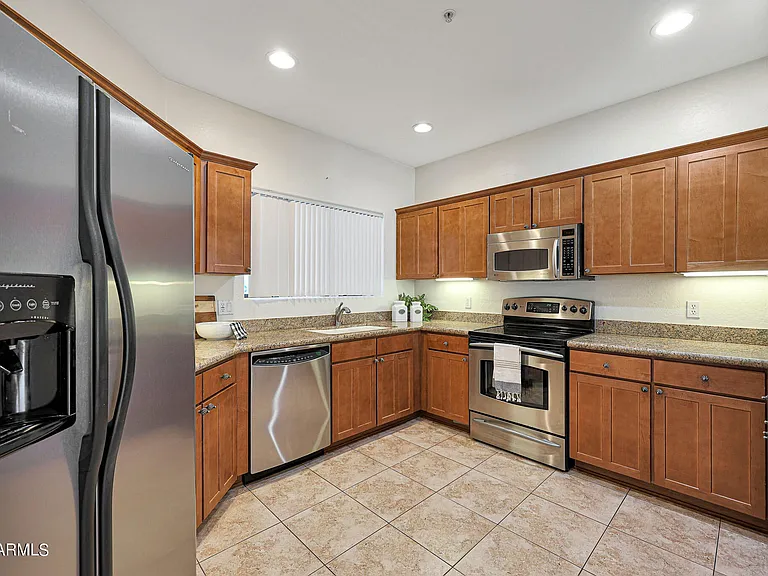 Spacious kitchen with generous counter and storage space