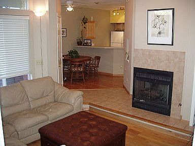 Family to kitchen, gas fireplace