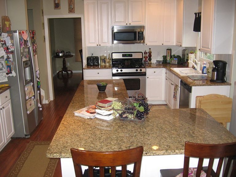 Stainless Steel appliances, granite tops, 42" cabinets large island 