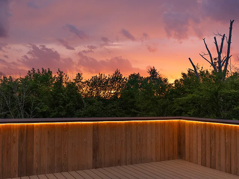 Rooftop front deck at dusk