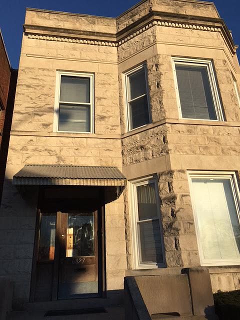 Front gray stone building