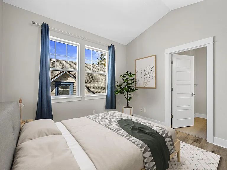 Bedroom 6. This image shows a virtually furnished space. Bedrooms come unfurnished.