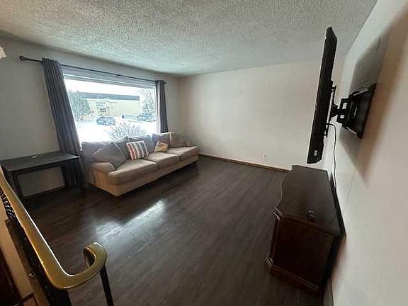 3rd image of 110 S 4th Ave E
