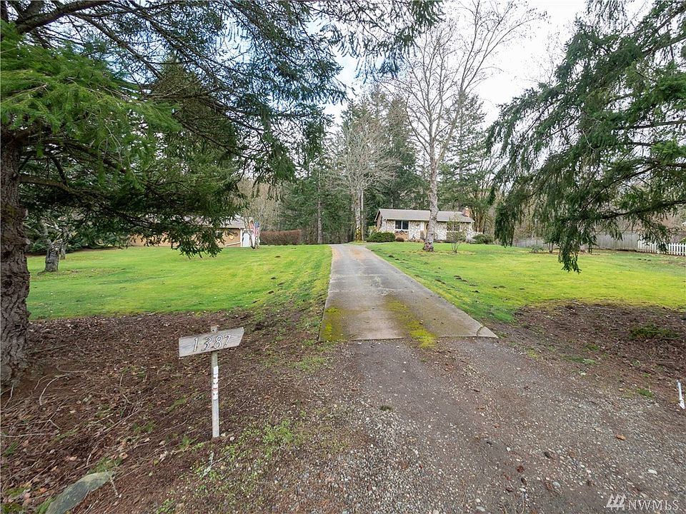 Secluded & meticulously maintained home on a shy 2.5 acres. It's a gem!