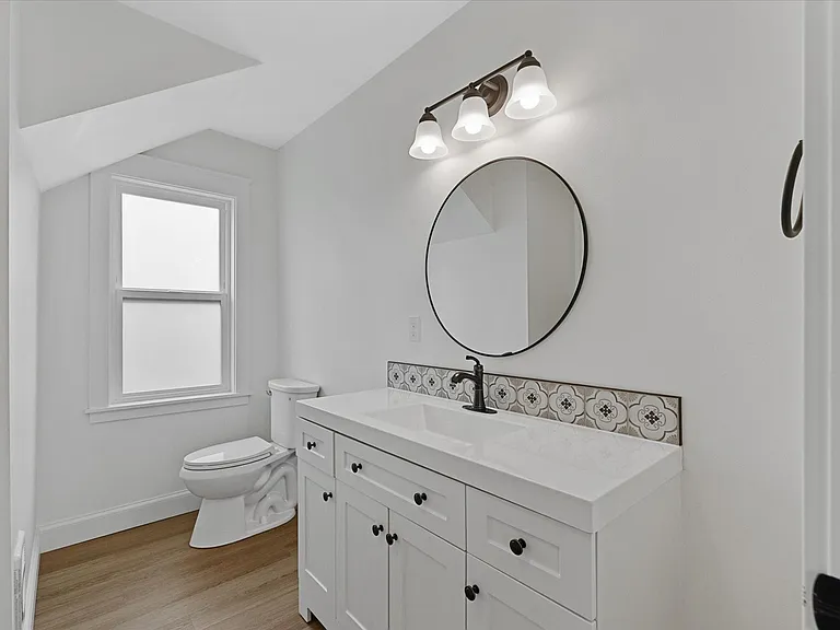 Another view of the half bath off the kitchen.