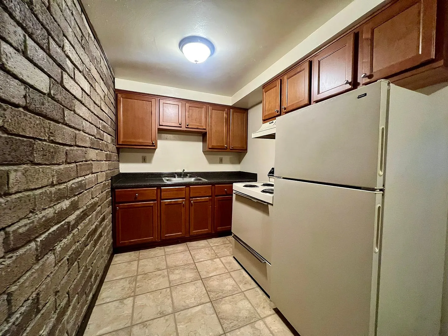 Cozy One Bedroom Apartment! Exposed Brick, Off-Street Parking & More! Call Today! — Photo 2