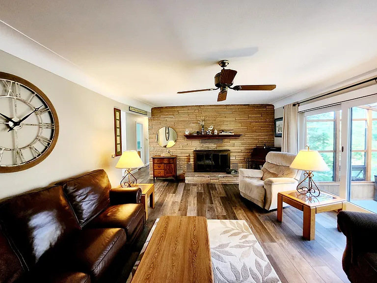 Living Room with Brick Fireplace