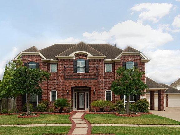Five bedroom home, 3 1/2 bath, and 3-car garage located in prestigious Springbrook section of Silverlake.
