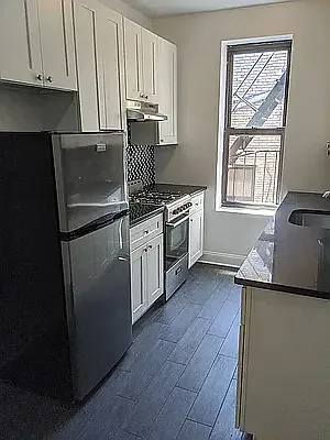 8740 Elmhurst Ave #304 — Photo 1