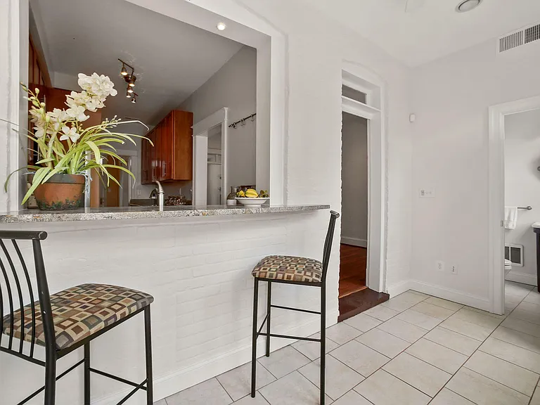 Sunny breakfast bar with kitchen pass-through