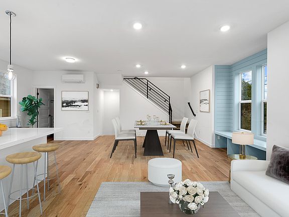 Spacious kitchen and open living space - view 3