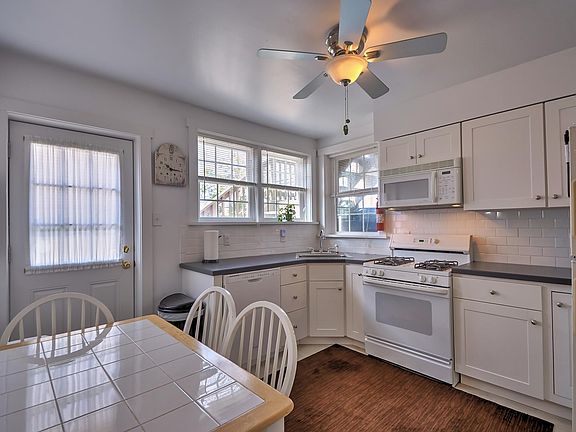 New Kitchen (shows door to fenced in backyard)