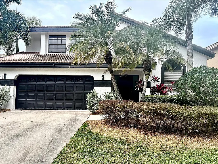 10461 NW 12th Ct — Photo 24
