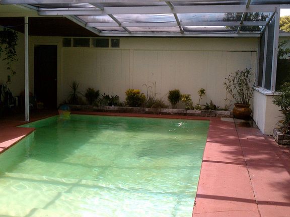 Peaceful, screened-in pool area