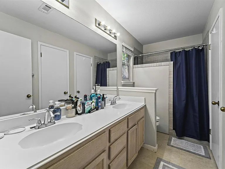 9000 Wellesley Dr — Photo 5