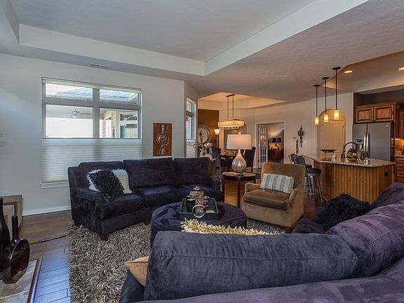 The buyer will love the open  flow of this house between the dining room, great room, and kitchen.  Abundant lighting (and have I mentioned that there are many, many dimmer switches on lights to help create just that right mood.)  Notice  that there is li