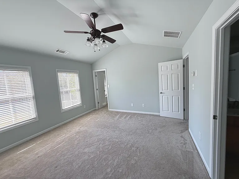 Main Bedroom with walk-in. Great natural light. Overlooks shared green space.