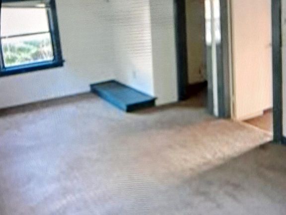 Smaller of two upstairs bedrooms