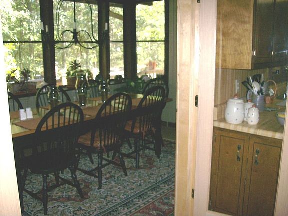 Dining Room looks out to private wooded backyard.