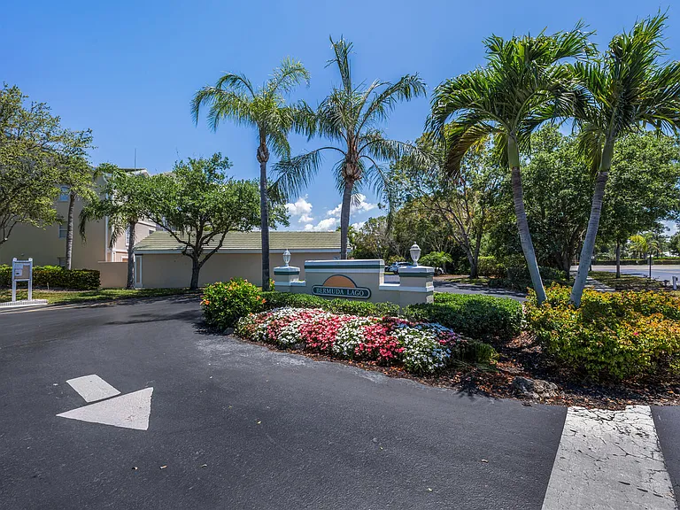 Bermuda Lago is a gated community with sidewalks and beautiful landscaping, including two small bridges and lakes where you can feed turtles.