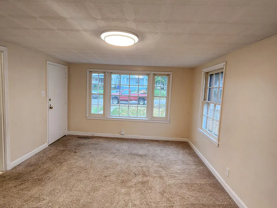 Spacious living room as you walk in the front door.