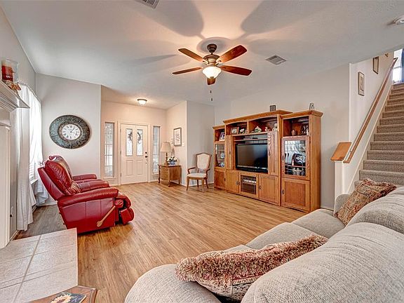 Another view of the family room shows you just how functional it is for a family. Plenty of room for activities!