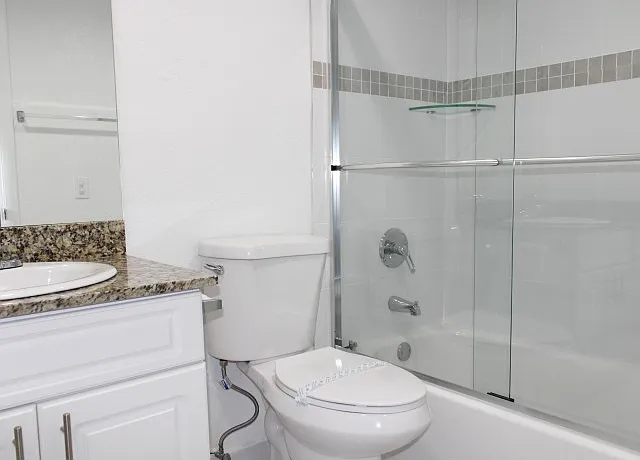Bathroom with Glass Shower Enclosures