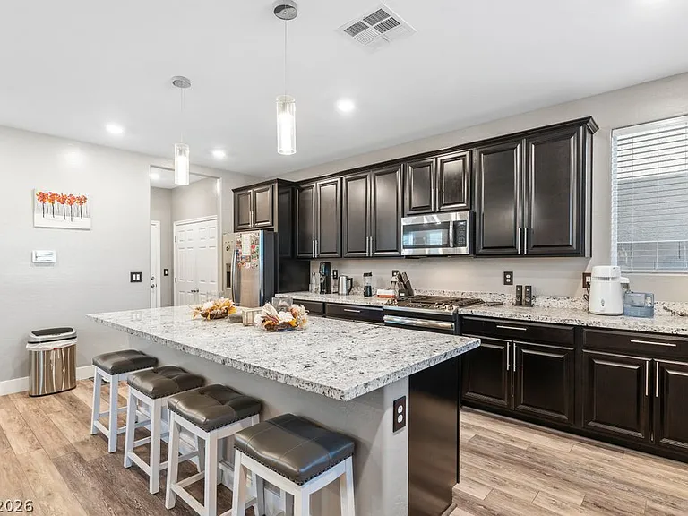 7036 Denio Island St — Photo 13