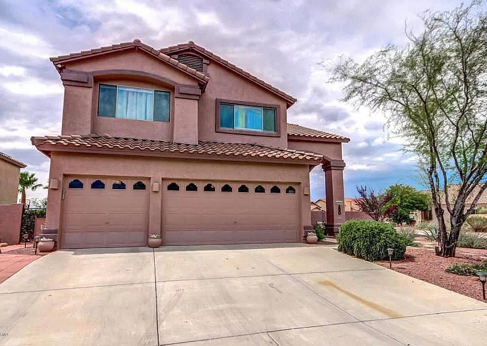 Front of the house with garage view