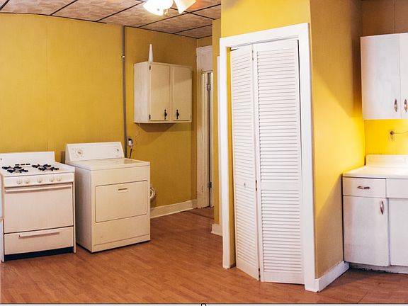 Kitchen with Washer and Dryer Included