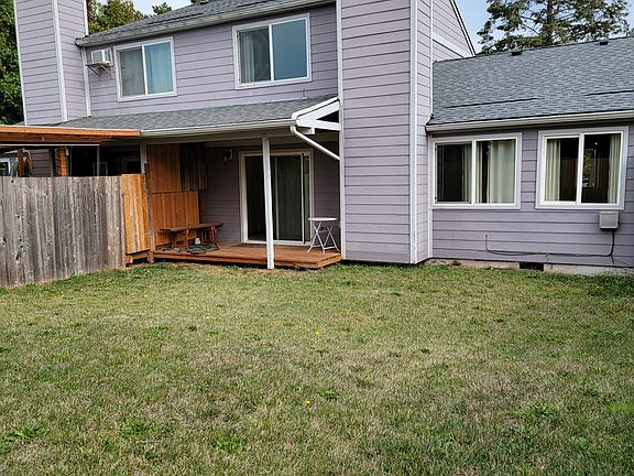 Back yard covered porch. Not pictured is the brand new fence with 2 gates.