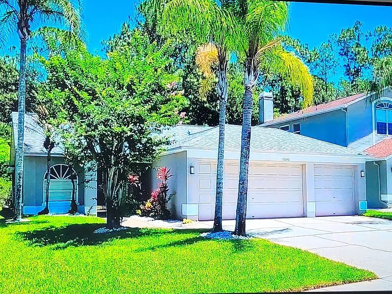 Front of house + 3 car garage