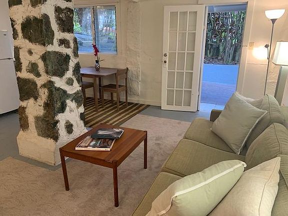 Looking out the front door from the living room you catch a glimpse of the dining area.