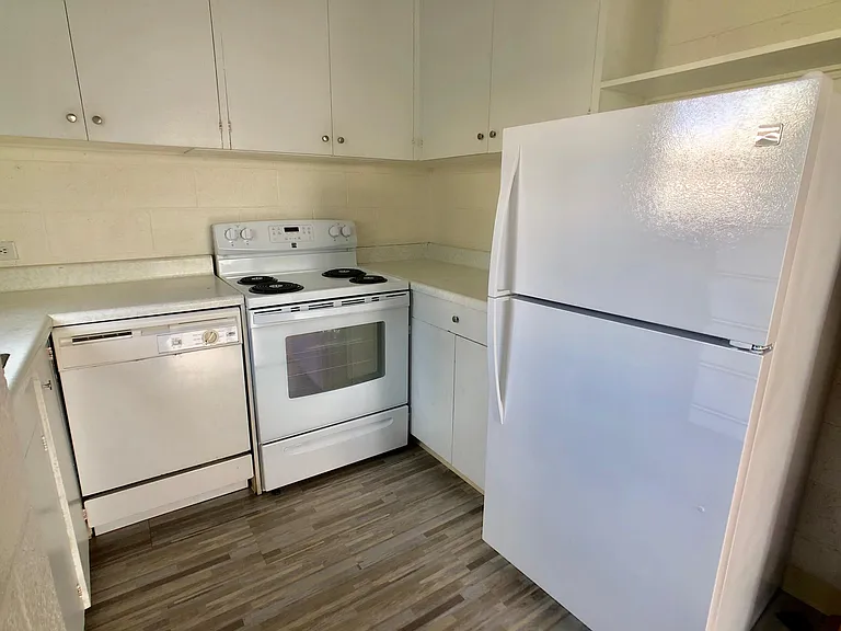 New Stove/Oven and Refrigerator and new laminate flooring