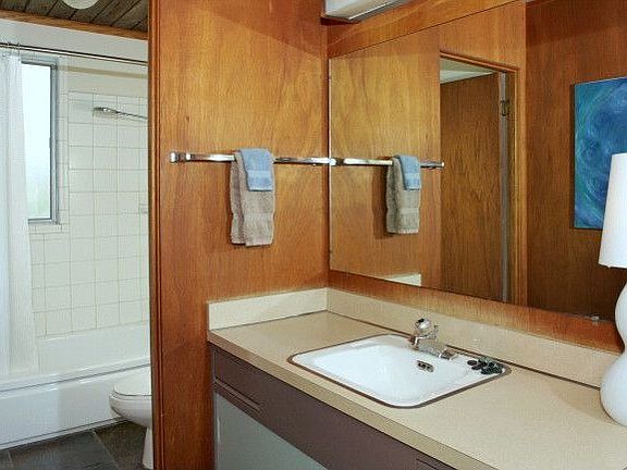 The Master Bath has been tastefully updated with slate and tile. 
