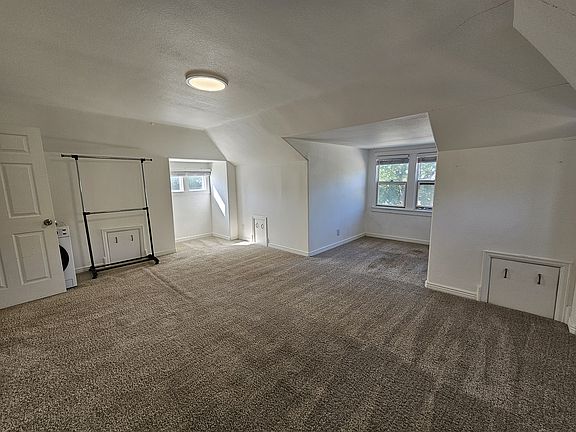 Windows on each cutout for all day sun in bedroom