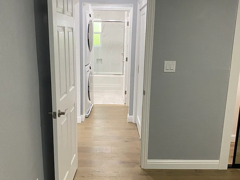 Bedroom 1 facing hallway and bathroom