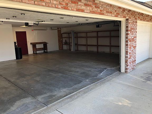 plenty of storage shelves in the garage