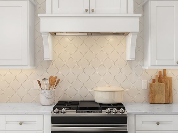 White tile backsplash in kitchen